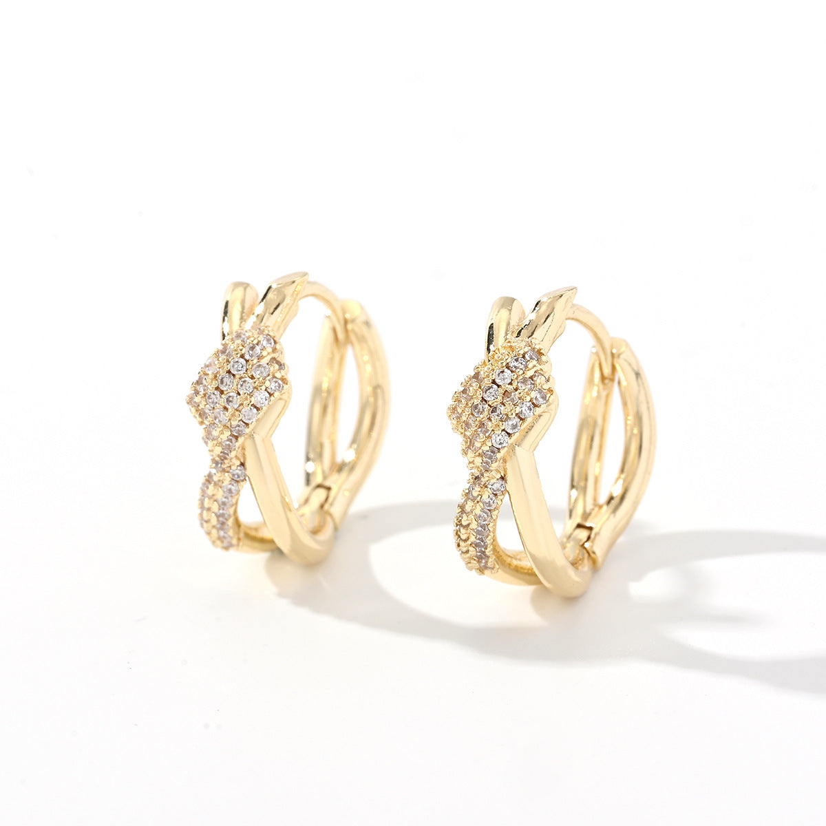 Twisted Gold Huggie Hoops with Pavé Accents